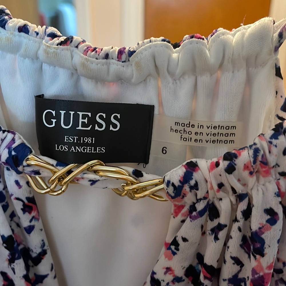 Size 6 women’s dress, purples, pinks, and white